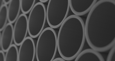 closeup of stack of welded pipe